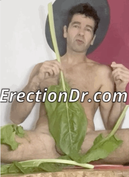 Picture of erection coach covering penis with green swiss chard spinach leaf